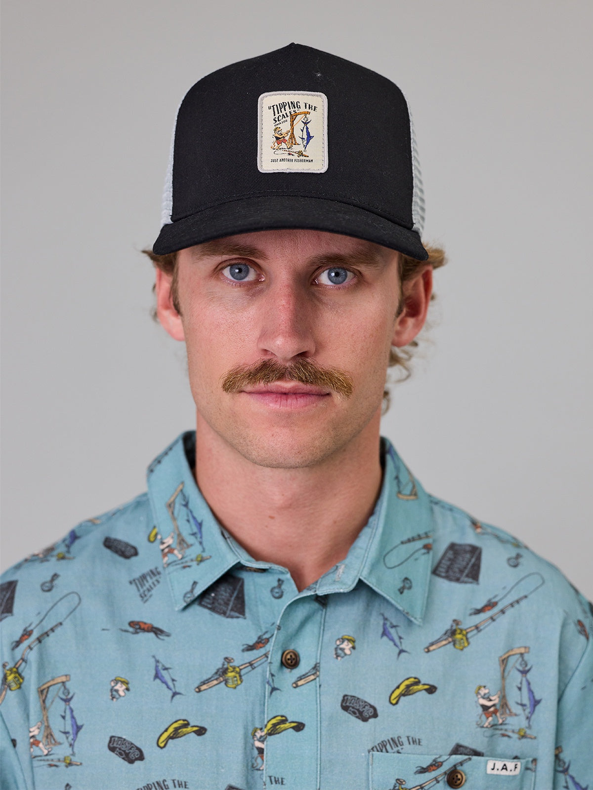 Just Another Fisherman Tipping The scales Lorry Cap- Black/Grey
