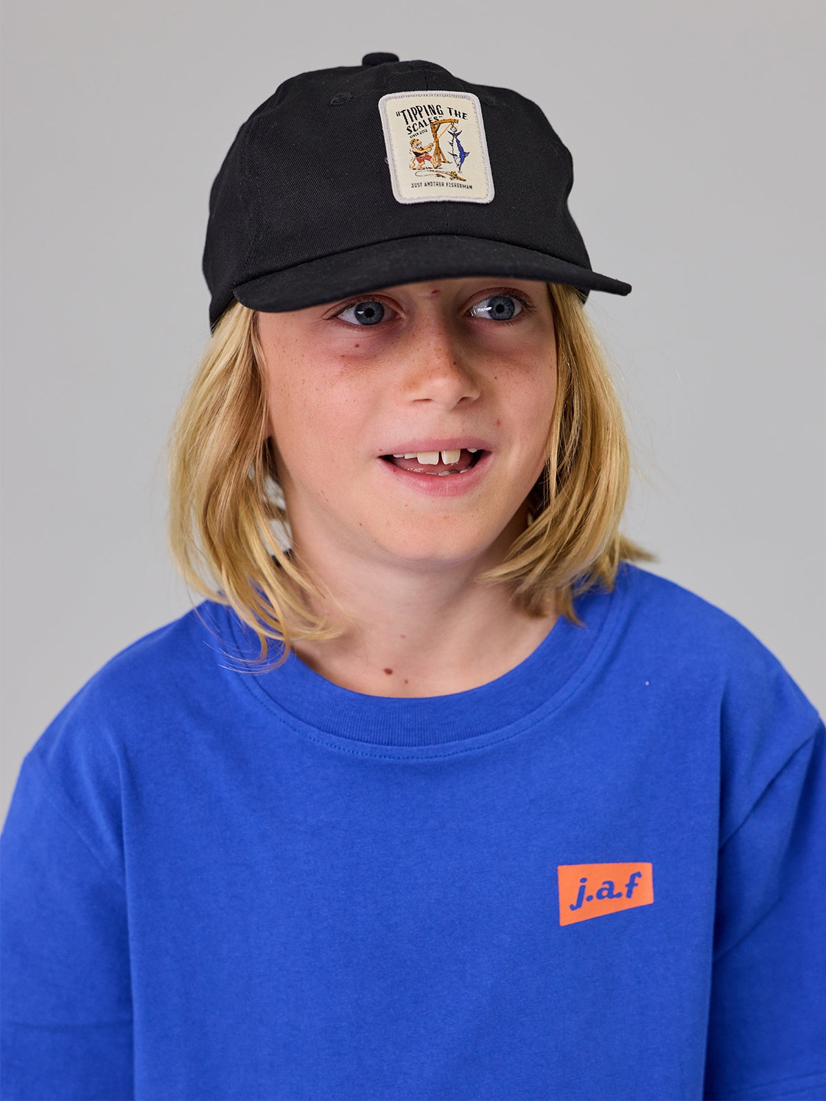 Just Another Fisherman Mini Tipping The Scales Kneel Cap Black